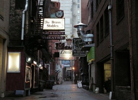Historic alley view with Lonnie's signs
